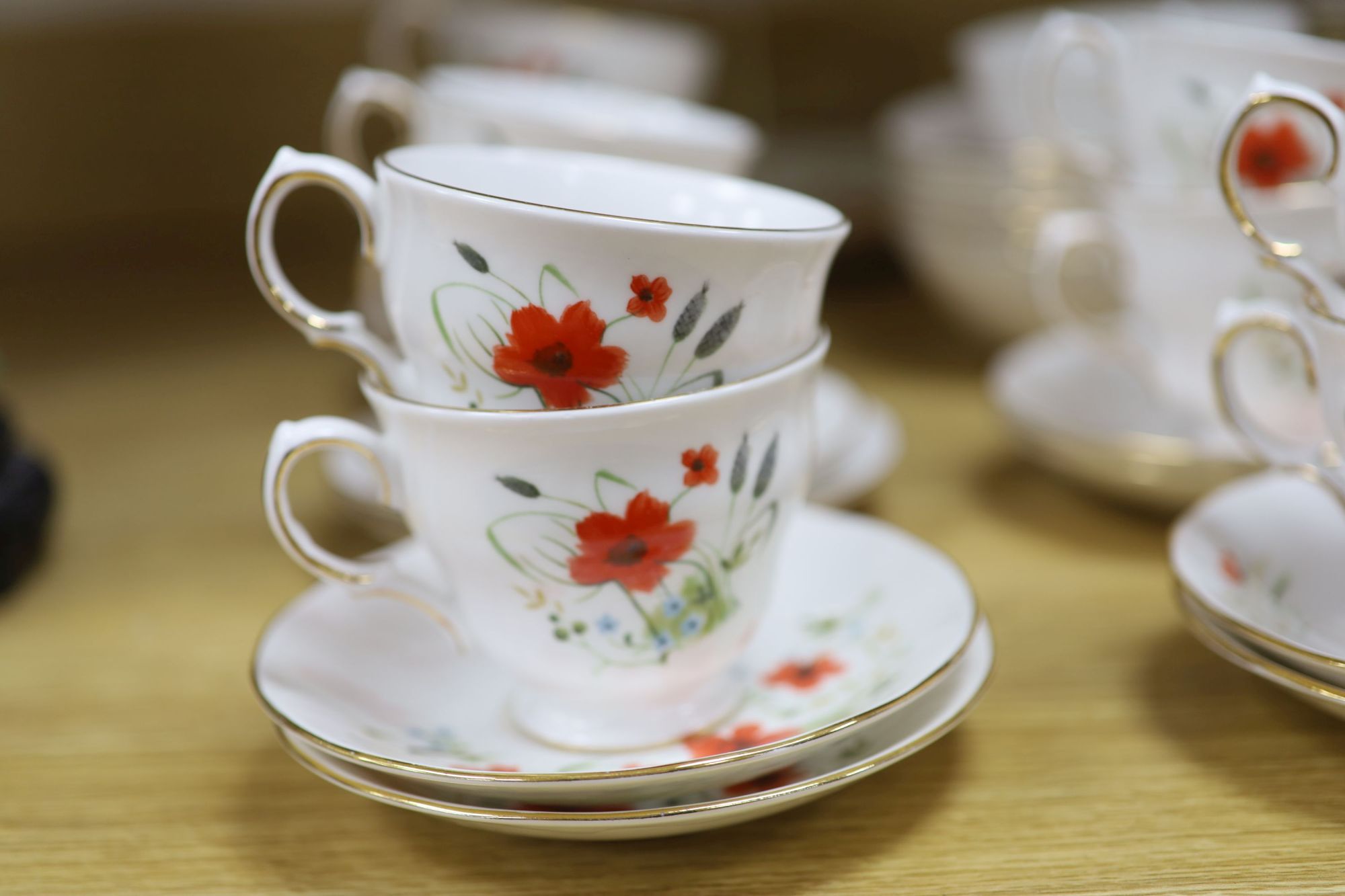 A Colclough floral decorated fifty nine piece part tea service